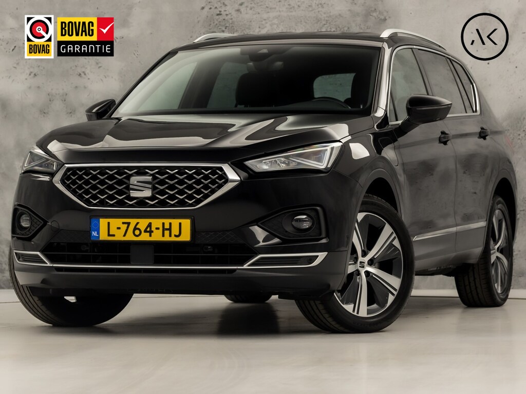 SEAT Tarraco 1.4 TSI e-Hybrid PHEV Xcellence Sport 245Pk Automaat (SOH 87%, APPLE CARPLAY, GROOT NAVI, MEMORY SEAT, LEDER, CAMERA, SPORTSTOELEN, STOELVERWARMING, ELEK ACHTERKLEP, GETINT GLAS, NIEUWSTAAT)