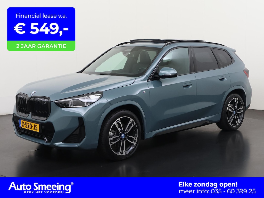BMW iX1 xDrive30 Launch Edition 67 kWh | SOH 100% | Panoramadak | Trekhaak | Leder | Head Up | 22kw lader | Zondag Open!
