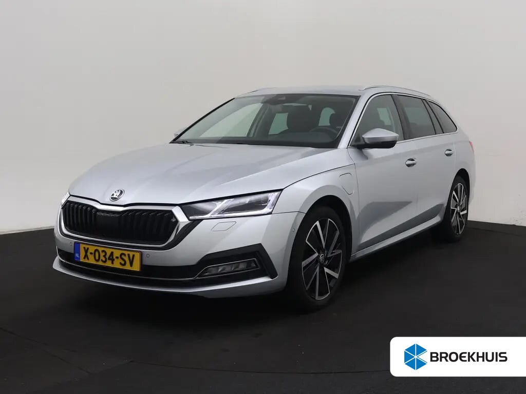 Skoda Octavia Combi 1.4 TSI iV PHEV Business Edition Plus | Cruise control adaptief | Elek. Verstelbare stoelen met Geheugen | Winterpakket | Led koplampen | Dodehoek detectie | Stoelverwaming Voor/Achter | Apple Carplay/Android Auto | Apple Carplay/Android Auto|telefoonintegratie premium | Cruise control adaptief | Dodehoek detectie