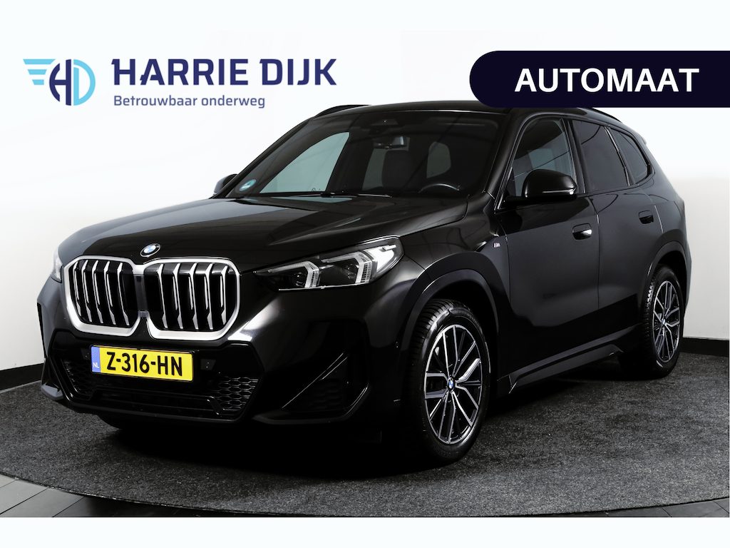 BMW X1 sDrive18i 136 PK M-Sport | Afn. Trekhaak | Dig. Cockpit | Cruise | PDC | Camera | NAV + App. Connect | ECC | Elek. Klep | LM 18" |