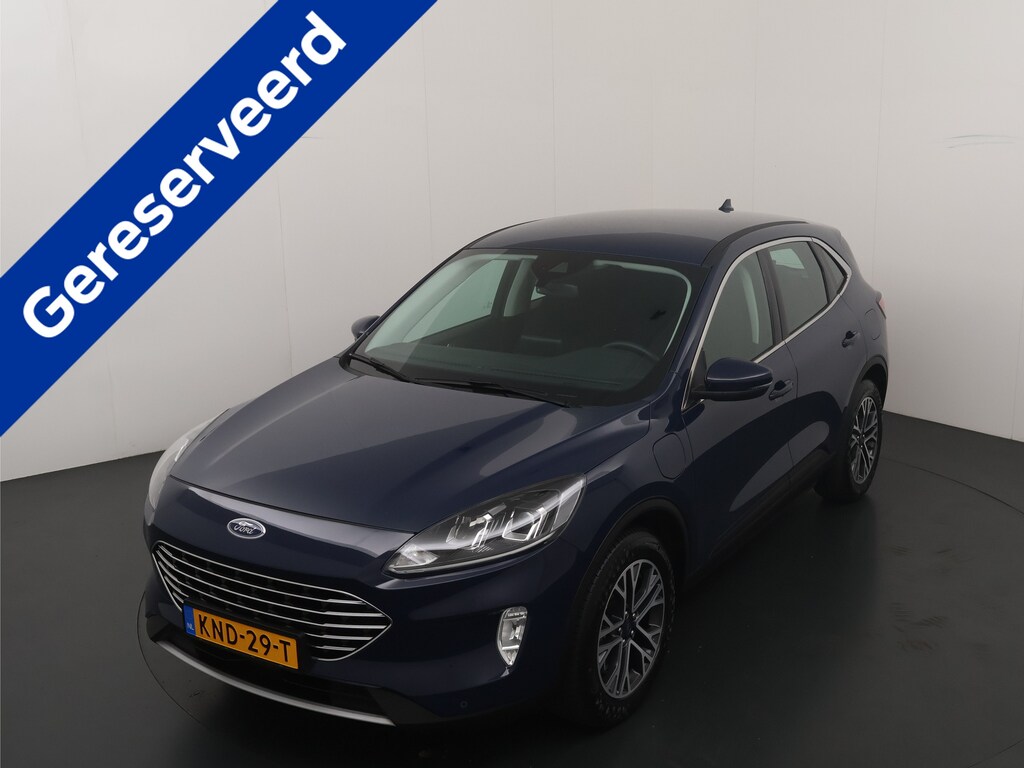 Ford Kuga 2.5 PHEV 225pk Titanium | Winterpack | Cruise control | Climate Control | Parkeersens V&A | Apple carplay / Android auto |