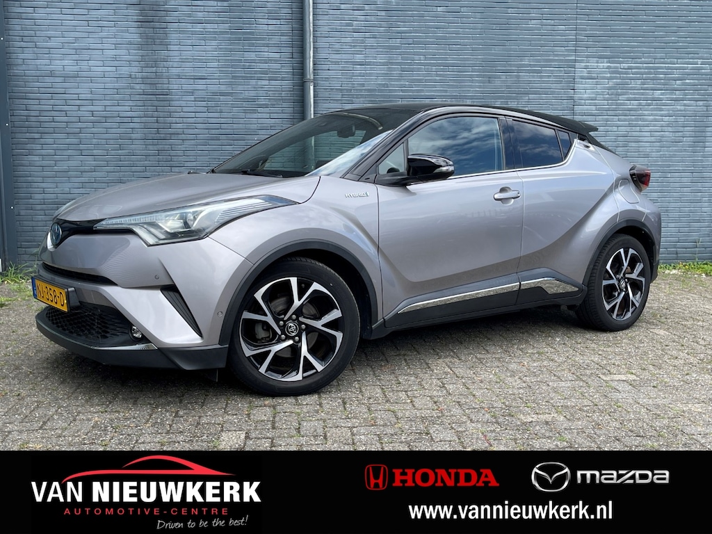 Toyota C-HR / C-HR+ 1.8 Hybrid 122pk Automaat Bi-Tone Plus | JBL Audio | Stoel/Stuurverwarming | Blindspot | Navi | Afneembare Trekhaak | Parkeercamera | LED |