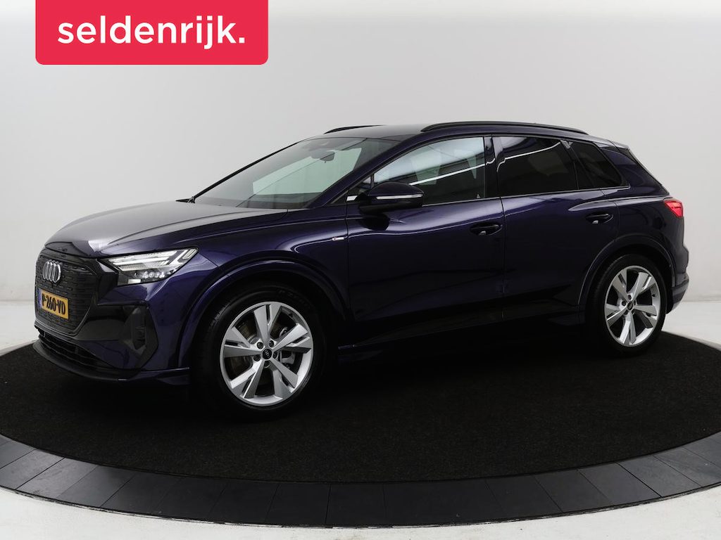 Audi Q4 e-tron 40 Launch edition S Competition 77 kWh | SOH 92,1% | Half leder | Stoelverwarming | Carplay | Adaptive cruise | Climate control | Camera | Park assist | Trekhaak