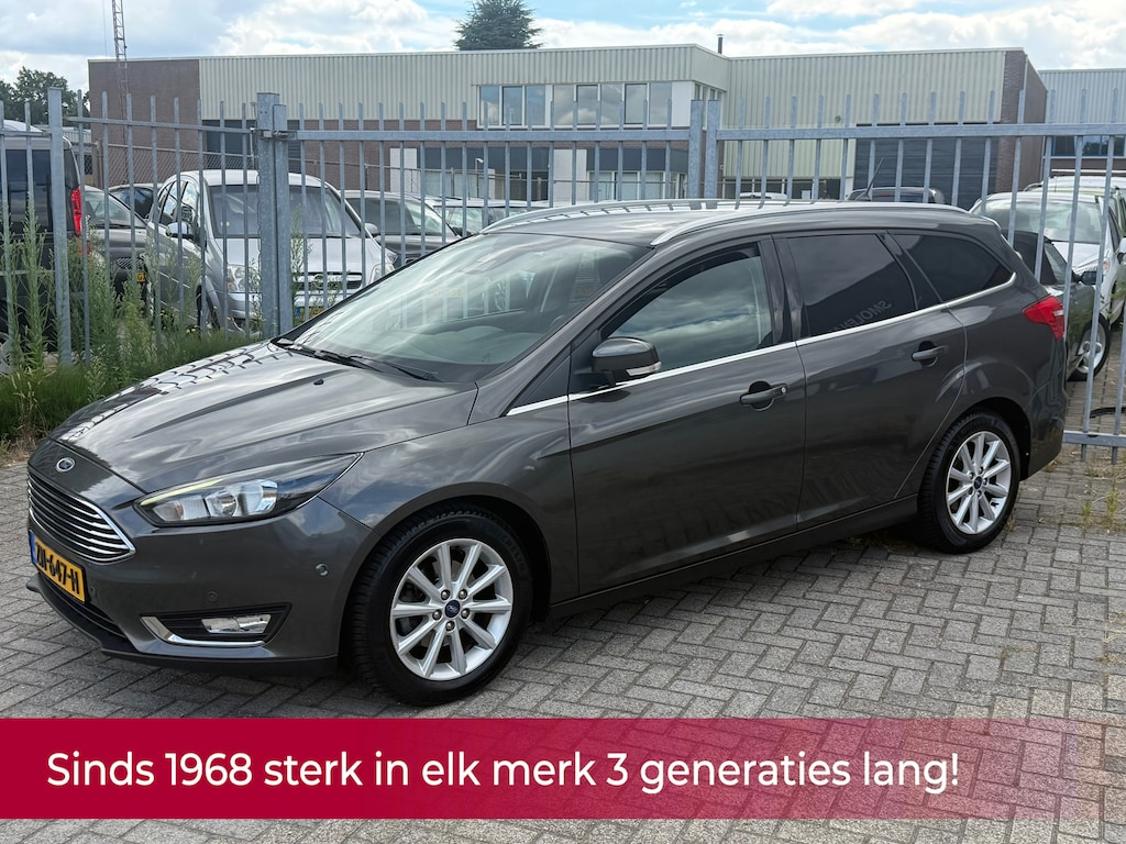 Ford Focus Wagon 1.0 Titanium D-riem nieuw! Navi l Cruise l Stoel&stuurverwarming l Keyless l Parkeerhulp l Trekhaak l TOPSTAAT!
