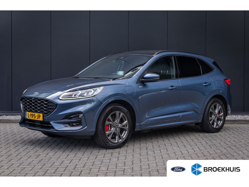 Ford Kuga 2.5 PHEV ST-Line X | SOH 93% | Panoramadak | Elec. Trekhaak | 100% Dealer O.h. | Adapt. Cruise | Head-Up Display | Elektr. Klep | Full LED | Dodehoek Detectie | B&O audio | Half Leder / alcantara | Standkachel | Winter-pack | Stuur & Stoelverwarming