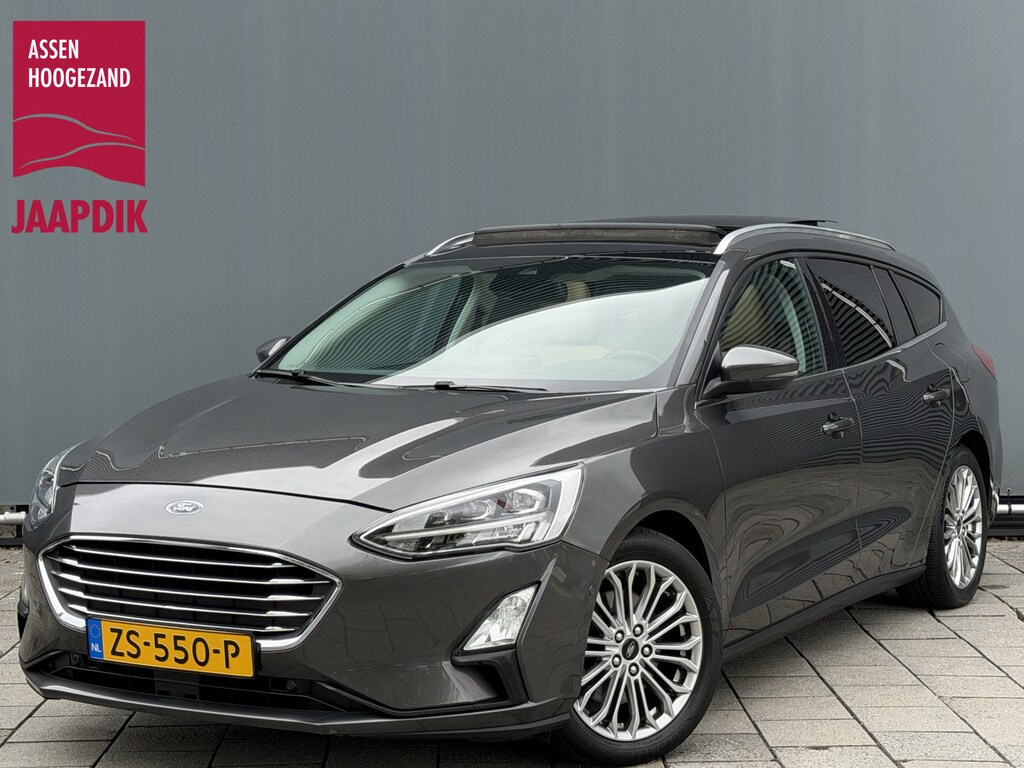 Ford Focus Wagon BWJ 2019 | 1.0T 126PK Titanium Bus AUTOMAAT | TREKHAAK | PANO DAK | LEER | LED | NAVI | CLIMA | STOEL&STUUR VERW | PDC | DONKER GLASS |