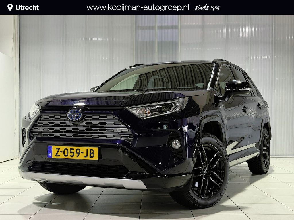 Toyota RAV4 2.5 Hybrid Style Afneembare trekhaak , Winterbanden set met lm velgen , Parkeersensoren , Applecarplay/Android auto , 2 Tone lak