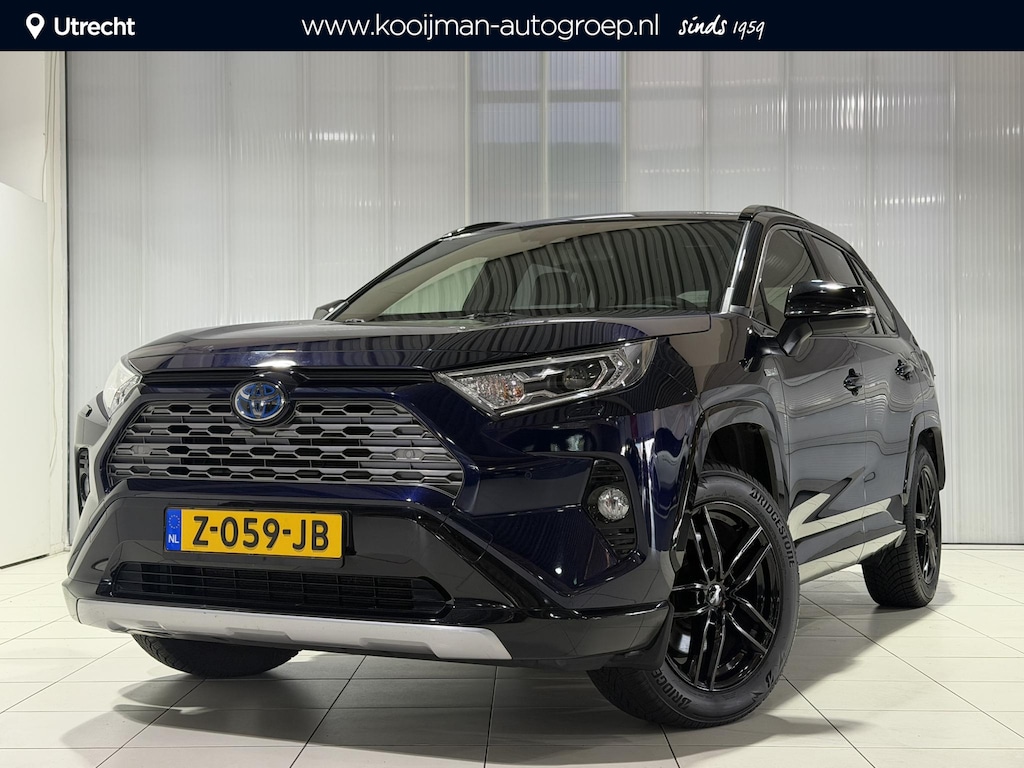 Toyota RAV4 2.5 Hybrid Style Afneembare trekhaak , Winterbanden set met lm velgen , Parkeersensoren , Applecarplay/Android auto , 2 Tone lak