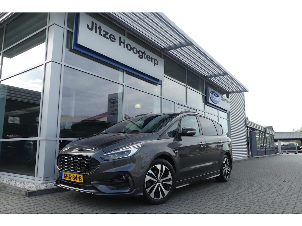 Ford S-Max 2.5 FHEV ST-Line AFN. TREKHAAK, MEMORY, WINTER PACK, ADAPT. CRUISE, CLIMA, NAVI, CAMERA V&A, PDC V&A, APPLE CARPLAY/ANDROID AUTO, BLIS, KEYLESS, ELEKT. ACHTERKLEP, ELEKT. STOELEN, 74.771KM