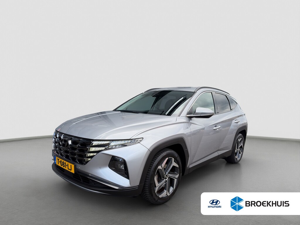 Hyundai Tucson 1.6 T-GDI 180pk Automaat MHEV 4WD Premium | Carplay | Camera | Adaptive Cruise | Leder | 19-inch velgen | Handsfree achterklep | Stoelverwaming/ventilatie | Trekhaak | Premium Audio | DAB | BLIS | Draadloze telefoonlader