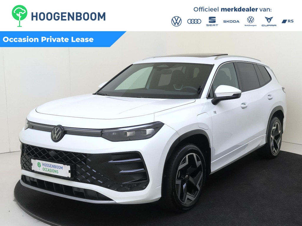 Volkswagen Tayron 1.5 eHybrid R-Line Edition | SoH 95% | Panoramadak | Trekhaak | Adaptieve demping | 360 camera | ErgoActive stoelen | Navigatie | Adaptieve cruise control | Stoel- en stuurwielverwarming |