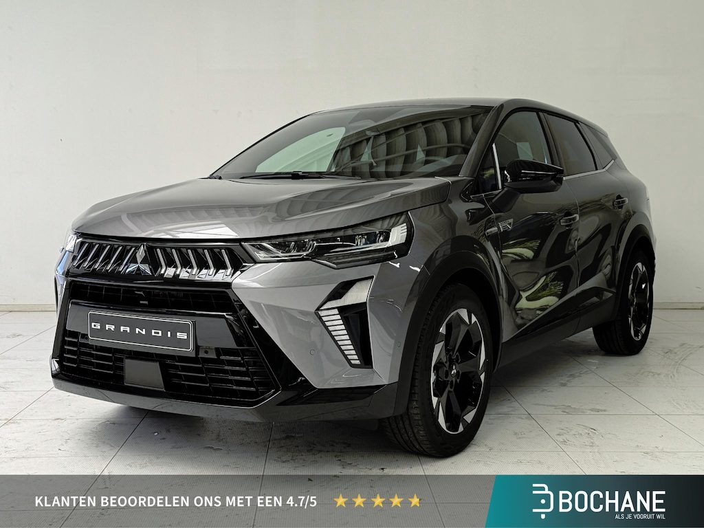 Mitsubishi Grandis 1.8 HEV Intense+ NIEUW UIT VOORRAAD LEVERBAAR | Verwarmbare voorstoelen | Parkeersensoren voor- en achter | Sfeerverlichting | Regensensor | Adaptieve Cruise Control | Verwarmbaar Stuurwiel | Apple CarPlay & Android Auto | 8 jaar fabrieksgarantie