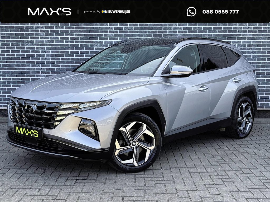 Hyundai Tucson 1.6 T-GDI PHEV Premium Sky 4WD | Panoramadak | Krell Audio | Stoelventilatie | Stoelverwarming voor en achter | Keyless Entry | Elektrische Achterklep | Elektrisch Verstelbare Voorstoelen | 360 Graden Camera | Parkeersensoren | Navigatie | Apple Carplay | Android Auto | Plug-in Hybrid