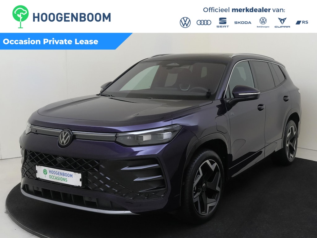 Volkswagen Tayron 1.5 eHybrid R-Line Edition | SoH 99% | Panoramadak | Trekhaak | Adaptieve demping | Head-up display | Harman/kardon | 360 camera | Stoelverwarming voor en achter | Parkeerassistent |