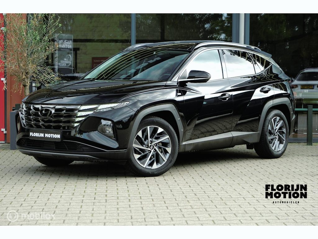 Hyundai Tucson 1.6 T-GDI MHEV Comfort Smart | Pano | Stoelverwarming | Trekhaak | 18 Inch | Carplay | LED | Camera | All seasons