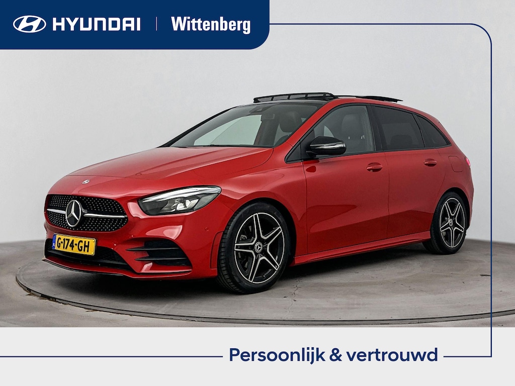 Mercedes-Benz B-klasse 180 Business Solution AMG | Schuif/kanteldak | Trekhaak wegklapbaar | Achteruitrij camera | Cruise control | Stoelverwarming | Navigatie |