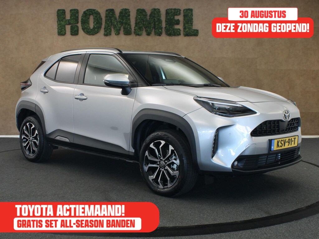 Toyota Yaris Cross 1.5 Hybrid 130 Dynamic - DODEHOEK DETECTIE - DIRECT UIT VOORRAAD LEVERBAAR - PARKEERSENSOREN VOOR EN ACHTER - STOEL & STUUR VERWARMING - DRAADLOZE TELEFOONLADER - KEYLESS ENRTY & START - BESTUURDERS EN BIJRIJDERSSTOEL IN HOOGTE VERSTELBAAR