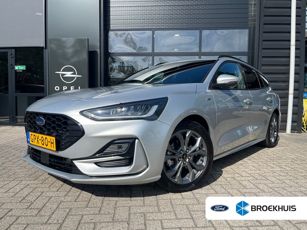 Ford Focus Wagon 1.0 EcoBoost Hybrid ST Line AUTOMAAT | STOEL, STUUR &VOORRUITVERWARMING| CLIMATE CONTROL| PARKEERSENSOREN V+A| DAB| NAVIGATIE+ APPLE CARPLAY/ANDROID AUTO|
