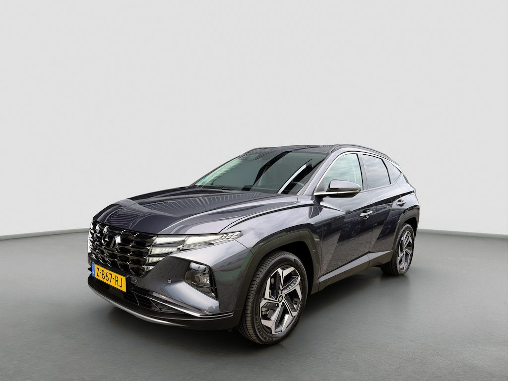 Hyundai Tucson 1.6 T-GDI PHEV 265pk Comfort 4WD | Carplay | Climate Control | 19-inch velgen | Adaptive Cruise | Camera | DAB | Draadloze telefoonlader | Parkeersensoren | Metallic lak