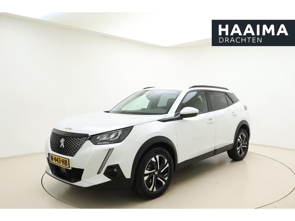 Peugeot 2008 1.2T Allure Pack | 130PK | Uniek Lage KM-stand | Trekhaak | Navigatie | Parkeercamera Achter | DAB+ | Cruise Control | Climate Control |