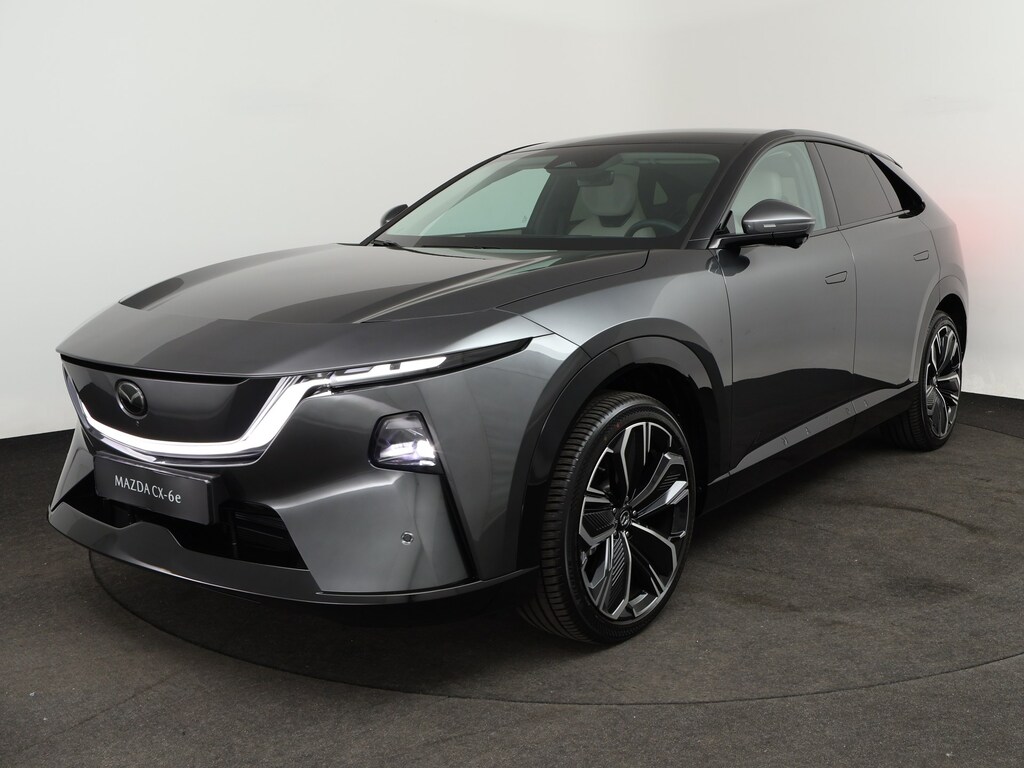 Mazda CX-6e 78 kWh Takumi | Alarmsysteem | Automatisch dimmende binnenspiegel met randloos design | Draadloze Apple CarPlay en Android Auto™