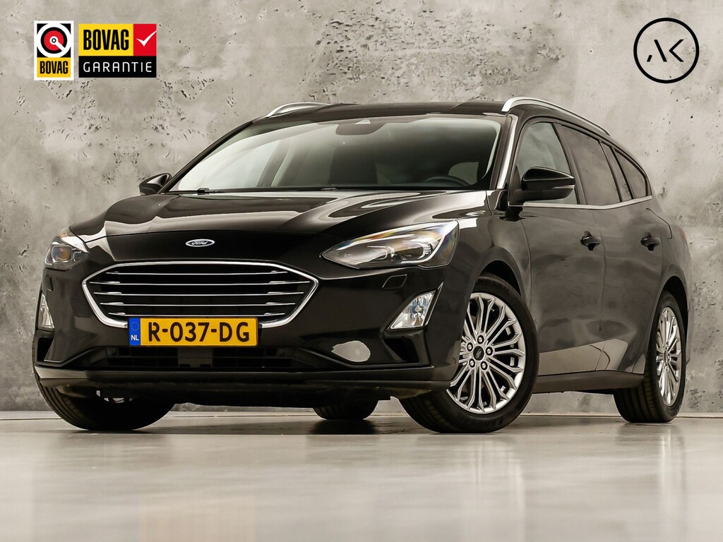Ford Focus Wagon 1.0 EcoBoost Titanium Sport (APPLE CARPLAY, GROOT NAVI, STUUR/STOELVERWARMING, CAMERA, SPORTSTOELEN, GETINT GLAS, ADAPTIVE CRUISE, NIEUWSTAAT)