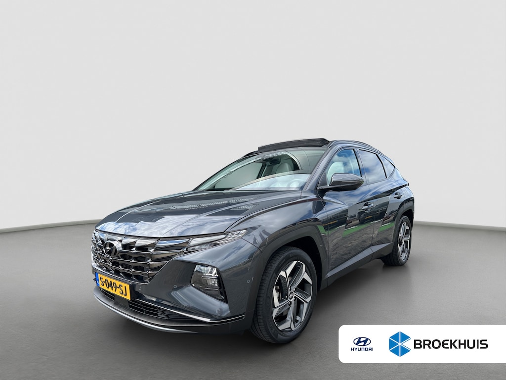 Hyundai Tucson 1.6 T-GDI 265pk PHEV Premium Sky 4WD | Carplay | Leder | Panoramadak | 19-inch Velgen | Navigatie | Camera | Adaptive Cruise | Stoelverwarming/ventilatie | Stuurverwarming | DAB | BLIS | Zonneschermen achter