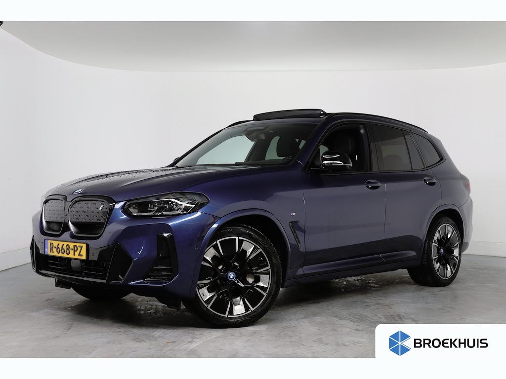BMW iX3 High Executive 80 kWh | M-Sport | Open Dak | Harman/Kardon | Leder | Memory Zetels | 360 Camera | LED | 20''' LMV | Cruise Adaptive | Sfeerverlichting | HUD | Keyless | Navi | Stoelverwarming | Clima