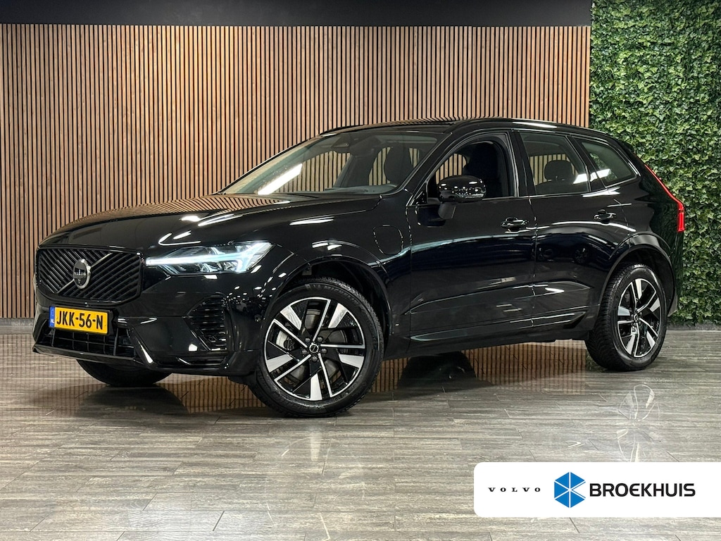 Volvo XC60 T6 AWD Recharge Plus Dark | Facelift | Schuifdak | Trekhaak | 360° Camera | Head-Up Display | Harman Kardon | All Season banden | Adaptieve Cruise Control | Stoelverwarming voor+achter | Stuurwielverwarming | Pilot Assist | BLIS Dode Hoek Detectie | 19 Inch | Elektrische voorstoelen geheugen | Quilted Nordico bekleding | Zitting verlenging voorstoelen | Google Infotainment | Keyless Drive | Parkeersensoren voor+achter | Elektrisch bedienbare achterklep | DAB Radio | Apple Carplay/Android Auto | Draadloos telefoon opladen | Volvo On Call met mobiele App functie | Onyx Black Metallic |