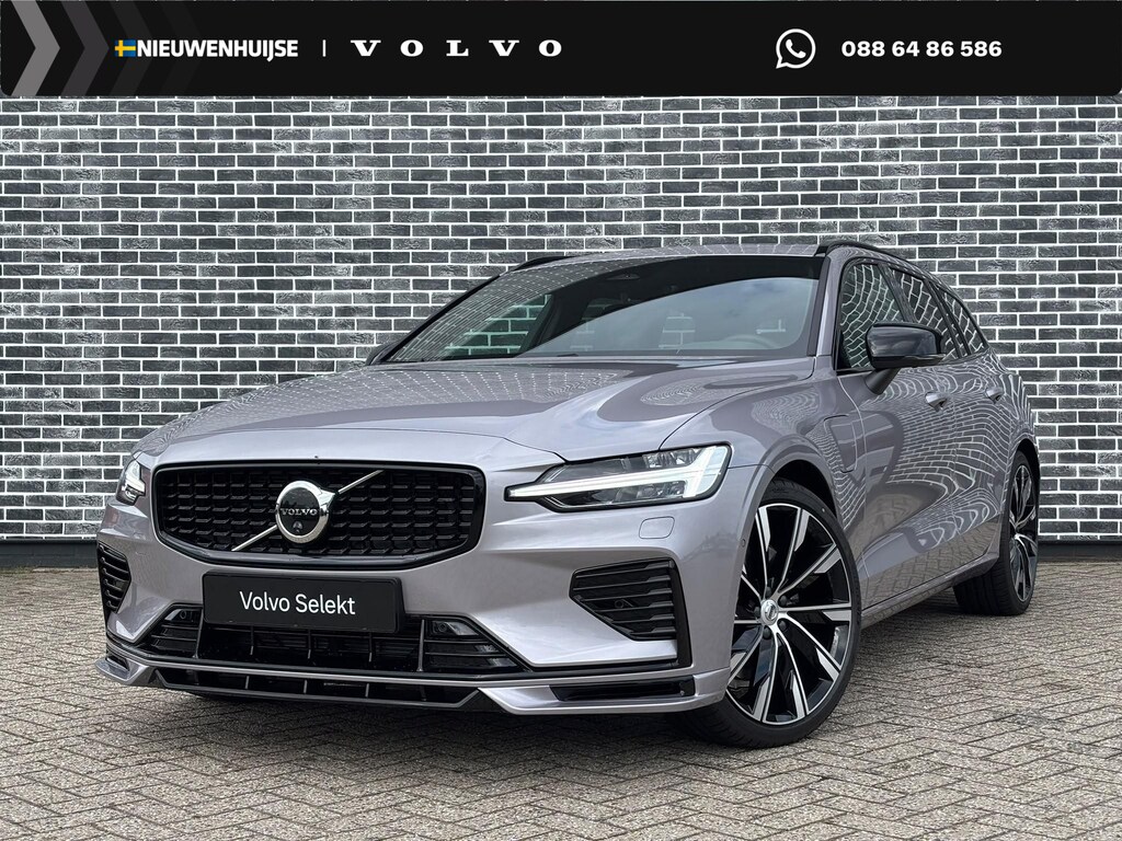 Volvo V60 T6 Plug-in hybrid AWD Ultra Dark | Heico bodykit | Google | Long Range | Schuif-/Kanteldak | Adaptieve Cruise Control | DAB | Head-Up Display | Camera | Stoelverwarming Voor + Achter | Harman Kardon Audio | Getint Glas | Zitverlenging | Elek. Stoelen | Memory | 19" LM