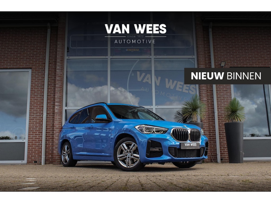 BMW X1 xDrive25e High Executive M sport | 1e eigenaar | Dealer onderhouden | Panoramadak | Apple Carplay | Camera | LED adaptief | Head-up | Stoelverwarming | Cruise control