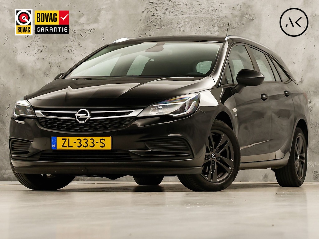 Opel Astra Sports Tourer 1.0 Turbo 120 Jaar Edition (APPLE CARPLAY, NAP, NAVIGATIE, LM VELGEN, PARKEERSENSOREN, SPORTSTOELEN, CRUISE, NIEUWE APK, NIEUWSTAAT)