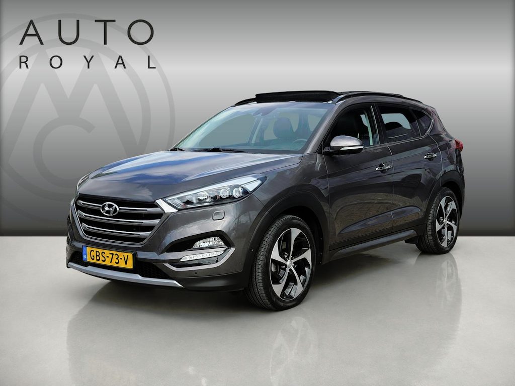 Hyundai Tucson 1.6 T-GDi Premium 4WD LEDER | KEYLESS ENTRY/G | AUTOMAAT | AWD | CAMERA | ELEKTRISCH VERSTELBARE STOELEN | STOELVERWARMING | STUURVERWARMING | STUURKOELING | PANORAMADAK | NAVIGATIE | LED | XENON KOPLAMPEN | APPLE CARPLAY / ANDROID AUTO | CRUISECONTROL |