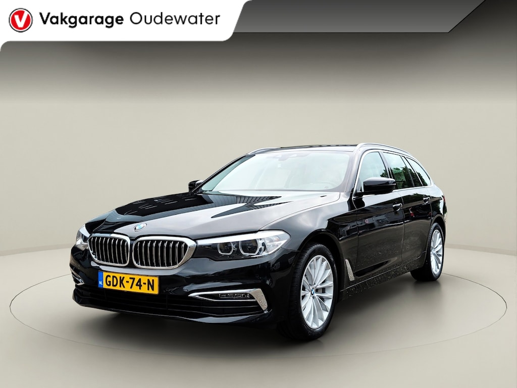 BMW 5-Serie Touring 530i High Executive * Camera * Trekhaak