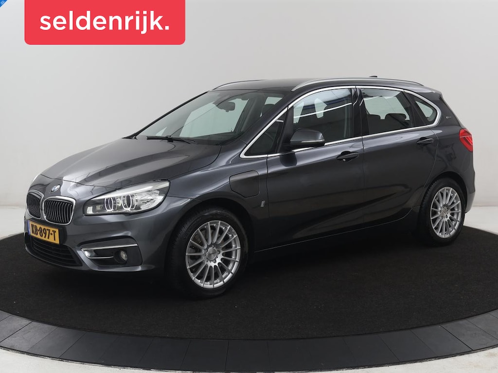 BMW 2-Serie Active Tourer 225xe iPerformance Centennial High Executive | SOH 88,6% | Leder | Stoelverwarming | Adaptive cruise | Head-up | Navigatie | Bluetooth | Camera | Park assist | Elektrische achterklep | Trekhaak