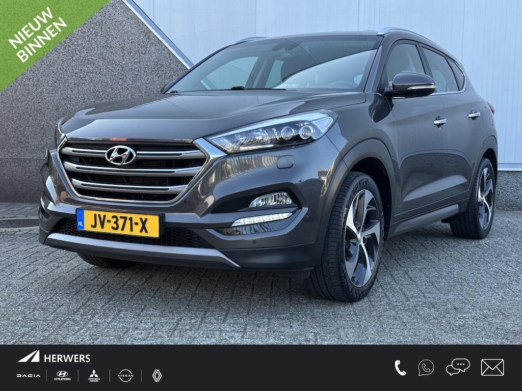Hyundai Tucson 1.6 T-GDi Premium / Lederen Bekleding / Stoelventilatie voor / Stoelverwarming voor + achter / Stuurwielverwarming / Achteruitrijcamera / Parkeersensoren Voor + Achter /
