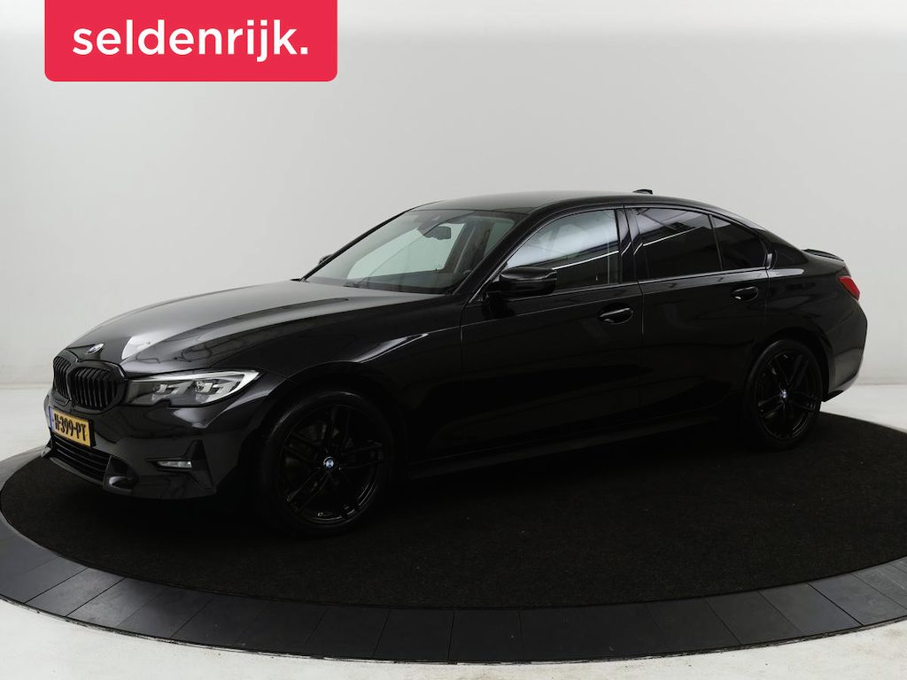 BMW 3-Serie 320i Executive Edition | Half leder | Cruise control | Navigatie | Bluetooth | Carplay | Park assist | Interieurverlichting | Virtueel dashboard | Climate control | Full LED | 18" velgen