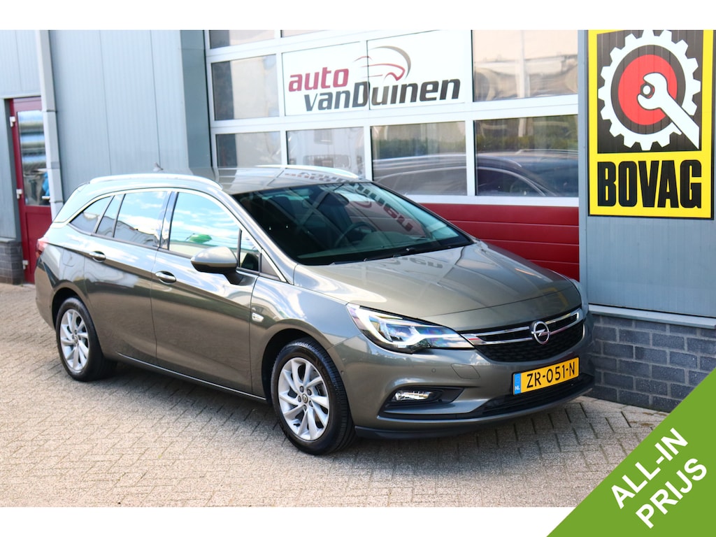 Opel Astra Sports Tourer 1.4 Turbo Innovation O.a: PDC, Camera, DAB, Clima, Navi, Cruise, Carplay, Etc. All-in prijs!