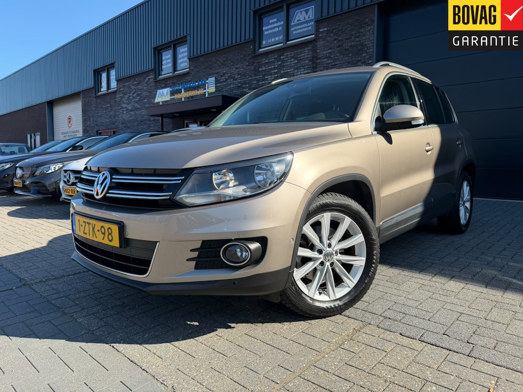Volkswagen Tiguan 1.4 TSI Sport&Style | 1E EIGENAAR |3/6/12 MND GARANTIE | NAVI | PDC | TREKHAAK | NL AUTO |