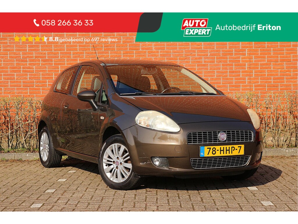 Fiat Punto Grande 1.4 77pk Edizione Lusso | NL-auto | Climate control | Cruise control | Elek. ramen | Lichtmetalen velgen | Bumpers in kleur | Radio/CD | Mistlampen |