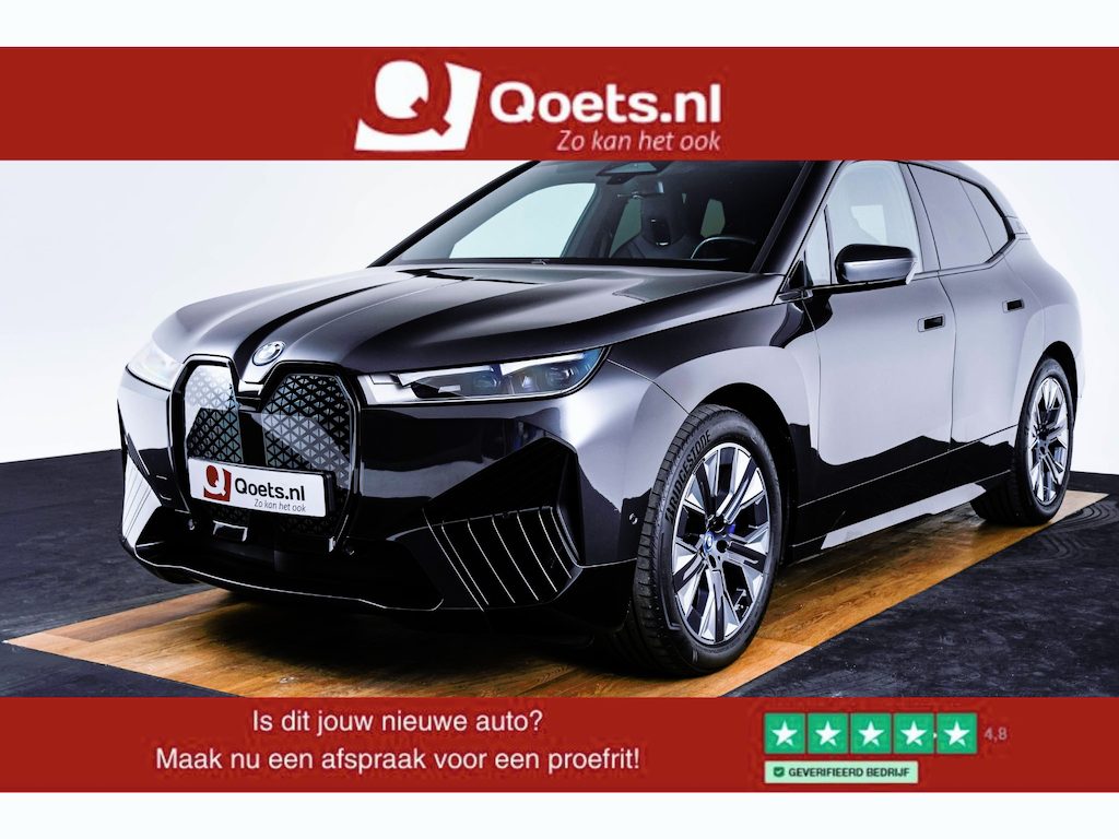 BMW iX xDrive40 Sportpakket - Trekhaak - Panoramadak - Multifunctionele stoelen voor - Getinte Ruiten -