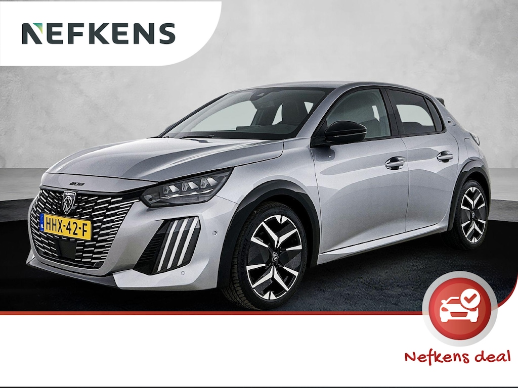 Peugeot 208 GT Hybrid 145pk Automaat | Navigatie | 360° Camera | Climate Control | Adaptieve Cruise Control | Parkeersensoren v+a | Armsteun | Keyless | Full Led koplampen | Dodehoeksensor| Leder/stof sportstoelen | Bluetooth | Draadloze Apple CarPlay / Android Auto + telefoonlader | DAB+ radio | Donker getint glas | 17" lichtmetalen velgen |