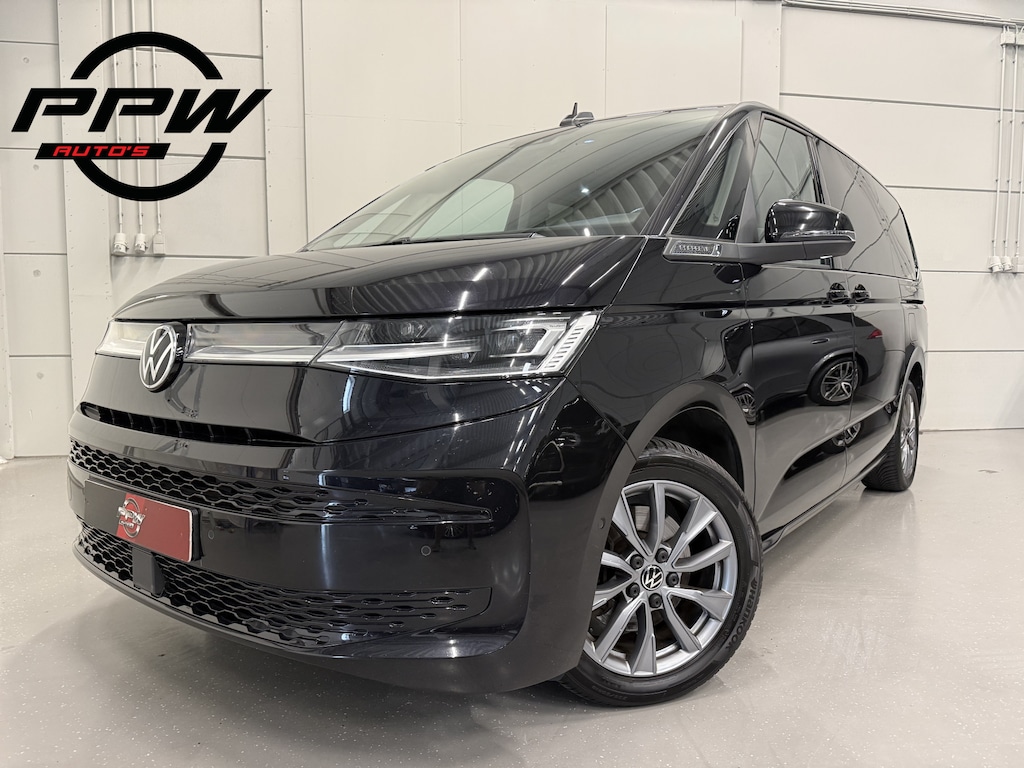 Volkswagen Multivan 1.4 eHybrid L2 Energetic 7p. PANO/EL.SCHUIFDEUREN/IQ-LIGHT/ACC/KEYLESS/CAMERA/SFEER/STOEL+STUURVERW/MIDDENCONSOLE/EL.A.KLEP/PARK-ASSIST/18"/DEEP BLACK METALLIC/VOLLEDIG VW DEALER HISTORIE, RECENT OH BEURT GEHAD