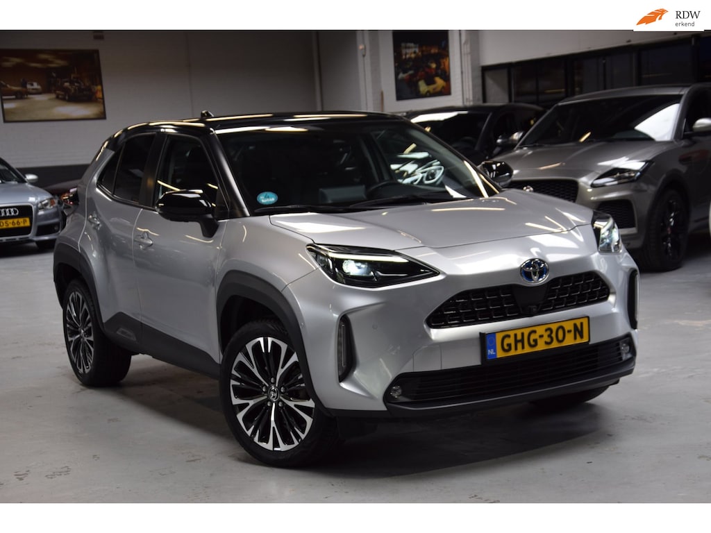 Toyota Yaris 1.5 Hybrid Executive Bi-Tone Hud Navi|Panoramadak|Garantie|Dealer Onderhouden