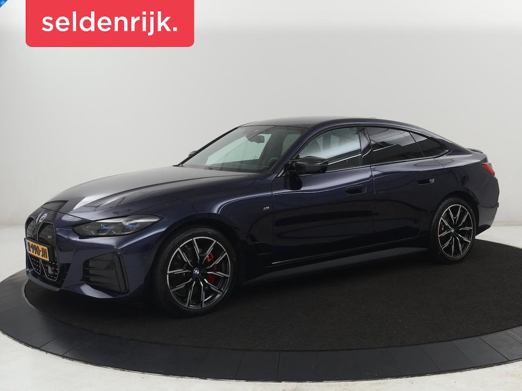 BMW i4 M50 High Executive 84 kWh | SOH 94,4% | Leder | Adaptive cruise | xDrive |  Stoelverwarming | Head-up | Harman/Kardon | Carplay | Sfeerverlichting | 360 camera | Park assist | Elektrische achterklep