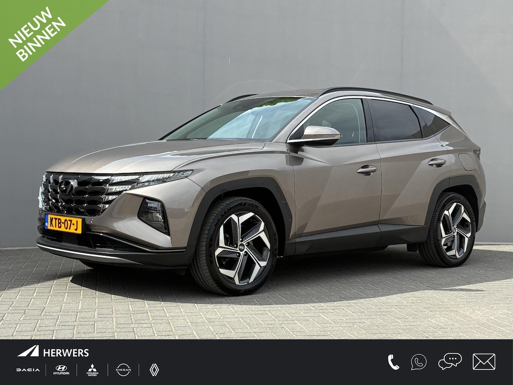 Hyundai Tucson 1.6 T-GDI PHEV Comfort Smart 4WD / Adaptief Cruise Control / Navigatie / Achteruitrijcamera / Apple Carplay & Android Auto / Stoel & Stuurverwarming / 19" LM Velgen / Elektrische Achterklep /