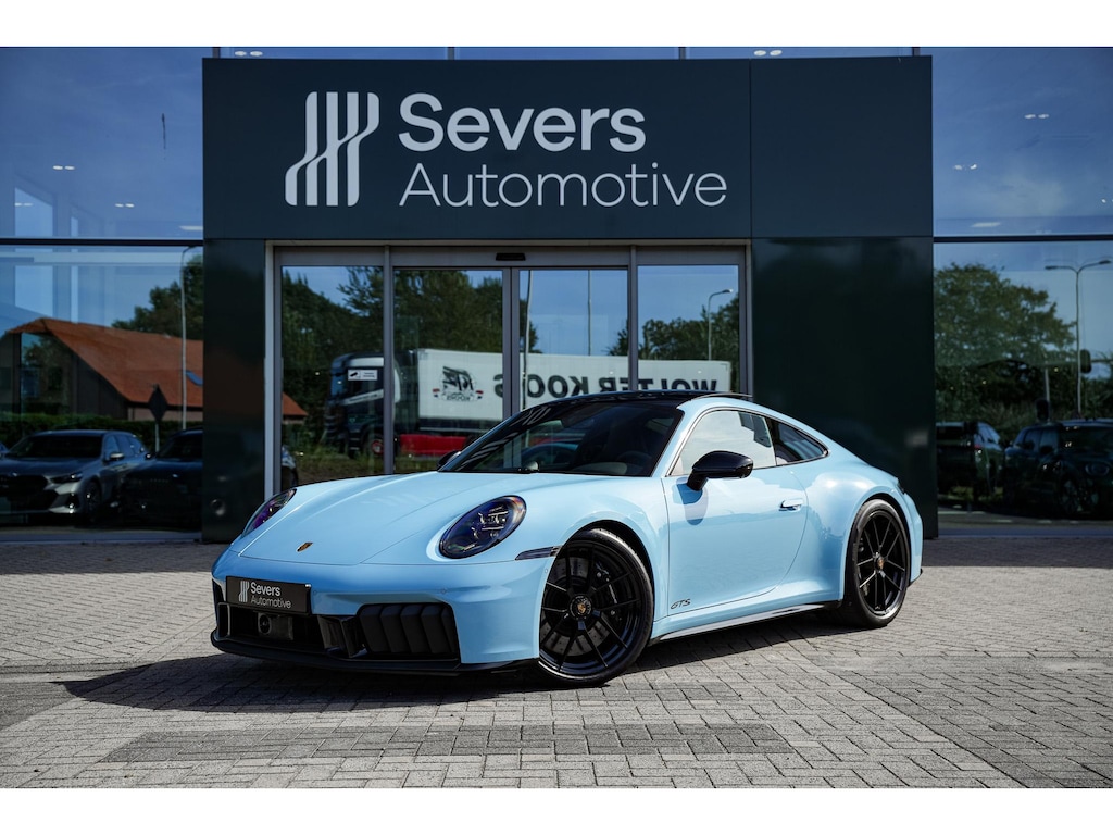 Porsche 911 3.6 T-Hybrid Carrera GTS | PTS Golf Blue | Porsche InnoDrive inclusief adaptieve cruise control | Schuifdak | Adaptieve 18-voudig Sportstoelen met geheugenpakket | Exterieurpakket Hoogglans Zwart | BOSE Surround-Sound-System | Stoelventilatie | Surround View inclusief actieve parkeerhulp | Comfort toegang |