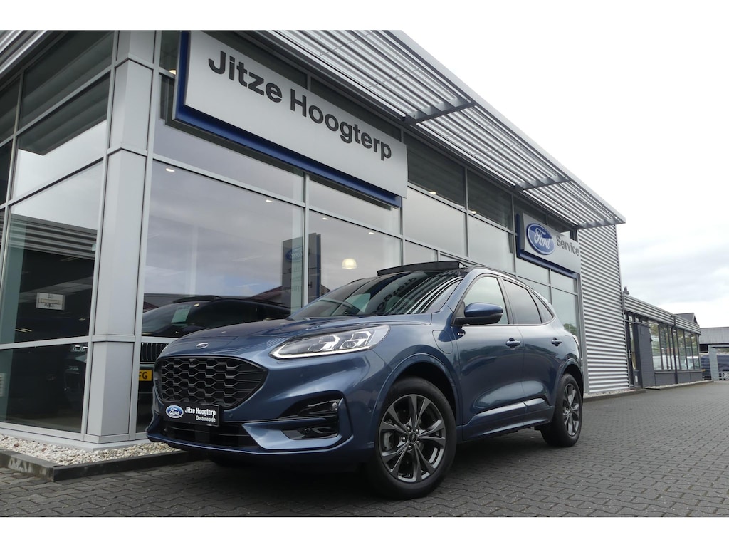 Ford Kuga 2.5 PHEV ST-Line X ELEKT. TREKHAAK (1.500KG), PANO, WINTER PACK, ADAPT. CRUISE, CLIMA, NAVI, CAMERA V&A, PDC V&A, APPLE CARPLAY/ANDROID AUTO, BLIS, KEYLESS, B&O, ELEKT. ACHTERKLEP, ELEKT. STOEL, 33.430KM