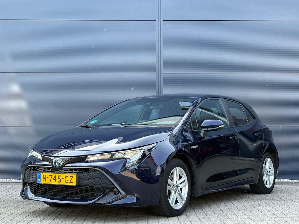 Toyota Corolla 1.8 Hybrid Active | Navigatie | Trekhaak | Climate Control | Cruise Control | Camera