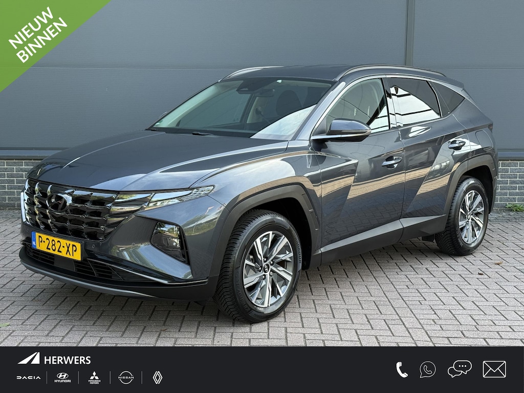 Hyundai Tucson 1.6 T-GDI HEV Comfort Smart / Eerste Eigenaar / Trekhaak / 1650KG Trekgewicht / Stuur & Stoelverwarming / Elektrische Achterklep / Keyless / Navigatie / Achteruitrijcamera /